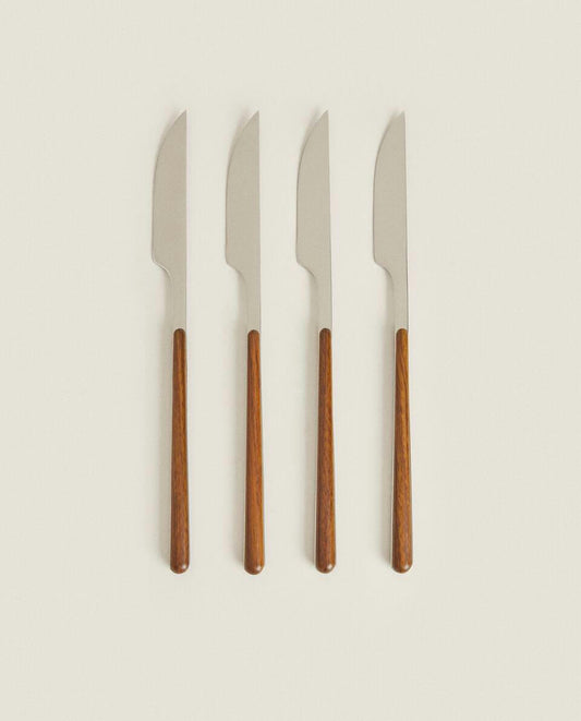 BOX 4 KNIVES WITH ROUND HANDLE DETAIL